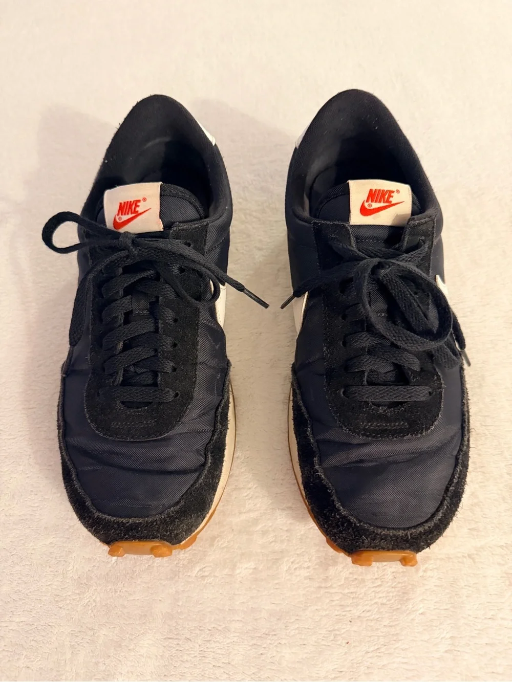 Nike Women’s Black Sneakers with White and Orange Accents